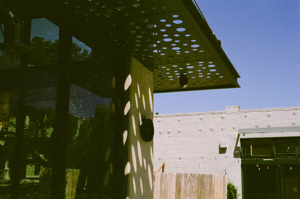 Metal building with circular holes